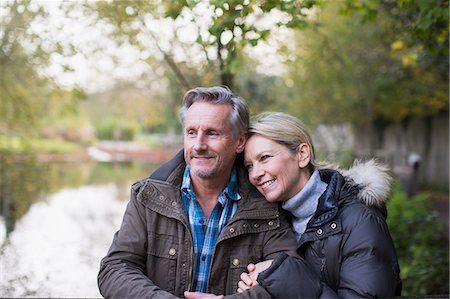 seniors happy - Affectionate mature couple in autumn park Stock Photo - Premium Royalty-Free, Code: 6124-09167252