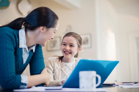 simsearch:649-06304951,k - Happy mother and daughter using laptop Stock Photo - Premium Royalty-Free, Code: 6124-09177909