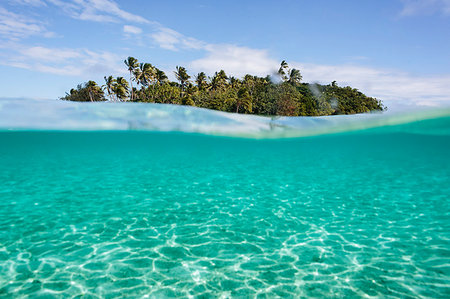 serenità - Tropical island beyond idyllic blue ocean water, Vava'u, Tonga, Pacific Ocean Fotografie stock - Premium Royalty-Free, Codice: 6124-09188683