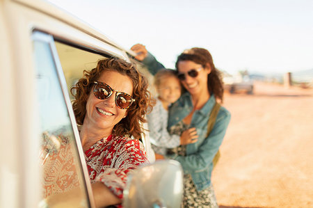 simsearch:6113-08393683,k - Portrait happy multi-generation women at van on sunny beach Stock Photo - Premium Royalty-Free, Code: 6124-09269465