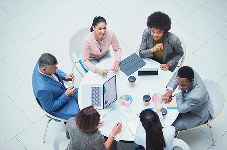 simsearch:6113-06899132,k - High angle view business people meeting at round table Stock Photo - Premium Royalty-Free, Code: 6124-09229200