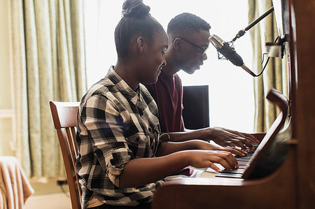 simsearch:649-06716505,k - Teenage brother and sister playing piano Stock Photo - Premium Royalty-Free, Code: 6124-09239358