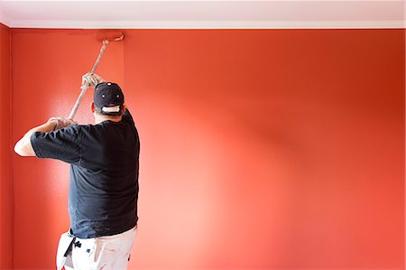 paint job - Sweden, Mature man painting wall Stock Photo - Premium Royalty-Free, Code: 6126-08643015
