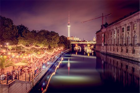 Germany, Berlin, Museum Island, Illuminated riverbank and reflections in water Stock Photo - Premium Royalty-Free, Code: 6126-08644585