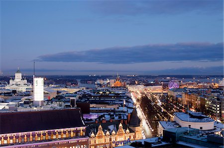 Finland, Helsinki, Illuminated cityscape at dusk Stock Photo - Premium Royalty-Free, Code: 6126-08644699