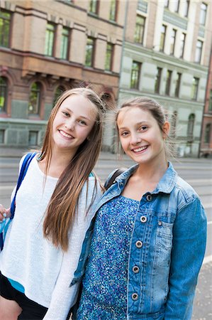Sweden, Vastra Gotaland, Gothenburg, Portrait of two smiling girls (14-15) Stock Photo - Premium Royalty-Free, Code: 6126-08659023
