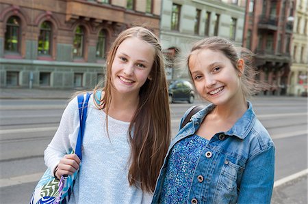 Sweden, Vastra Gotaland, Gothenburg, Portrait of two smiling girls (14-15) Stock Photo - Premium Royalty-Free, Code: 6126-08659024