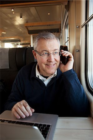 simsearch:6126-08635498,k - Sweden, Businessman talking on phone Stock Photo - Premium Royalty-Free, Code: 6126-08635187