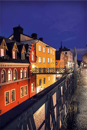 simsearch:6126-08643547,k - Sweden, Stockholm, Sodermalm, Bellmansgatan, Street in night Fotografie stock - Premium Royalty-Free, Codice: 6126-08635423