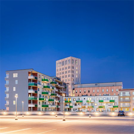 simsearch:6126-08643547,k - Sweden, Skane, Malmo, Hyllie, Residential buildings at night Fotografie stock - Premium Royalty-Free, Codice: 6126-08635761