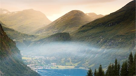 simsearch:6126-08643505,k - Norway, More og Romsdal, Sunnmore, View of town by lake in mountains Stock Photo - Premium Royalty-Free, Code: 6126-08636329