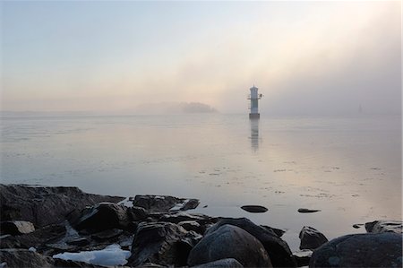 simsearch:6126-08643505,k - Sweden, Uppland, Lidingo, View of lighthouse Stock Photo - Premium Royalty-Free, Code: 6126-08636452