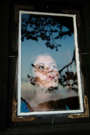 summerhouse - Portrait of young woman in summerhouse in Dalarna, Sweden Stock Photo - Premium Royalty-Free, Code: 6126-09266489