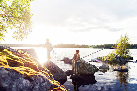 Friends fishing on a lake in Dalarna, Sweden Photographie de stock - Premium Libres de Droits, Code: 6126-09204376