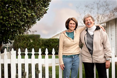 photo picket garden - A mother and daughter laughing together. Stock Photo - Premium Royalty-Free, Code: 6128-08766701