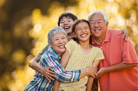 simsearch:700-01234773,k - Portrait of smiling senior couple with their grandchildren. Stock Photo - Premium Royalty-Free, Code: 6128-08767173