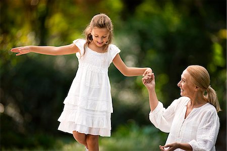 families wealthy - Woman playing with her granddaughter. Stock Photo - Premium Royalty-Free, Code: 6128-08780749