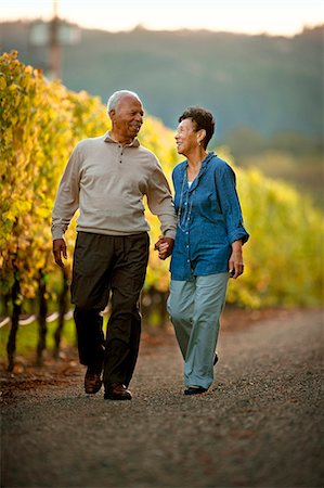 elderly african american male - Senior couple walking through a vineyard. Stock Photo - Premium Royalty-Free, Code: 6128-08780952