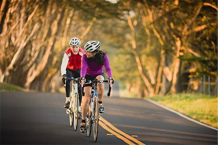 Mature woman and older man out cycling together Stock Photo - Premium Royalty-Free, Code: 6128-08798892