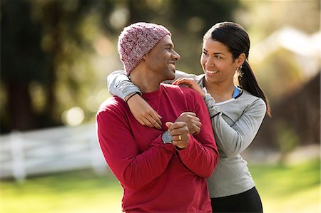 filming - People holding a dancing king pose during an outdoor yoga session. Stock Photo - Premium Royalty-Free, Code: 6128-08727578