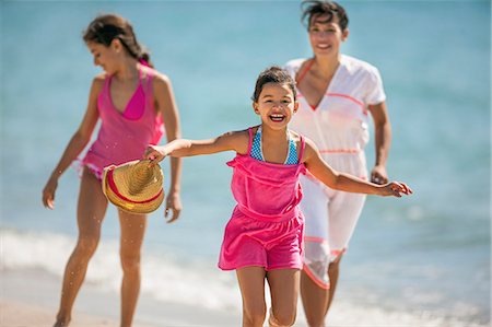 preteen play on the beach - Family at the beach Stock Photo - Premium Royalty-Free, Code: 6128-08737718