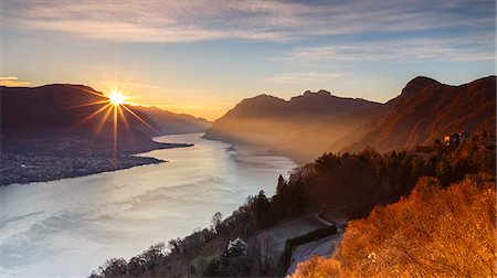 Sunrise on lake Como, Civenna, Como province, Lombardy, Italy, Europe Fotografie stock - Premium Royalty-Free, Codice: 6129-09044133