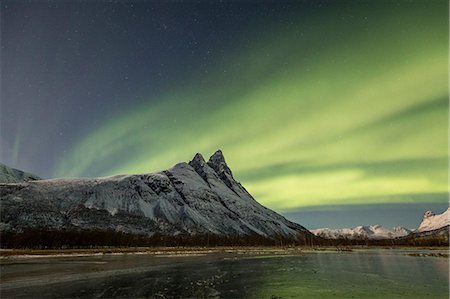 Northern lights above mount Otertind, Storfjord,Troms,Norway,Europe Stock Photo - Premium Royalty-Free, Code: 6129-09044357