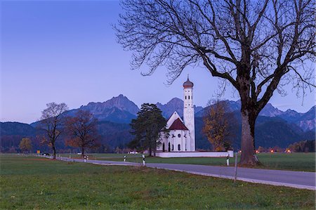 schwangau - Sunrise on St Coloman Church surrounded by woods. Schwangau, Fussen, Bavaria, Southwest Bavaria, Germany, Europe. Stock Photo - Premium Royalty-Free, Code: 6129-09086672