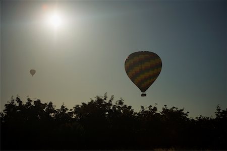 simsearch:625-00801301,k - Low angle view of a hot air balloon flying in the sky Stock Photo - Premium Royalty-Free, Code: 625-00804347