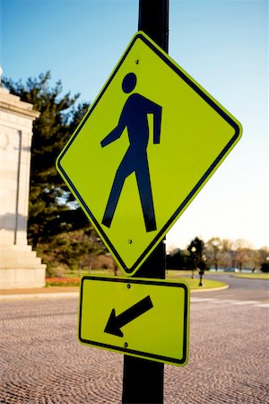 simsearch:625-01094222,k - Pedestrians Crossing sign with an arrow on bottom, Washington DC, USA Stock Photo - Premium Royalty-Free, Code: 625-00804528