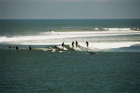 simsearch:625-00805928,k - Distant view of a group of people surfing, Malibu, California, USA Stock Photo - Premium Royalty-Free, Code: 625-00804694