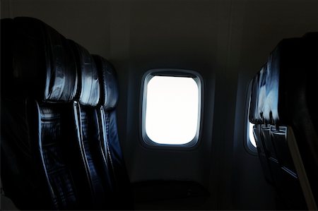 Close-up of empty airline seat Stock Photo - Premium Royalty-Free, Code: 625-00804782