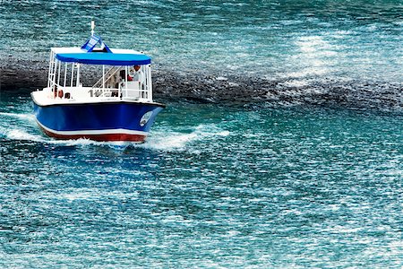 High angle view of a water taxi moving on a river, Chicago River, Chicago, Illinois, USA Stock Photo - Premium Royalty-Free, Code: 625-00805566