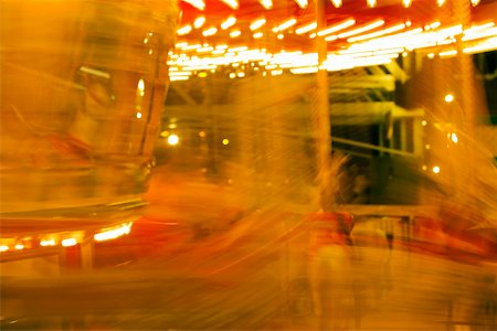 Lights on a carousel in an amusement park at night, San Diego, California, USA Stock Photo - Premium Royalty-Free, Code: 625-00805793