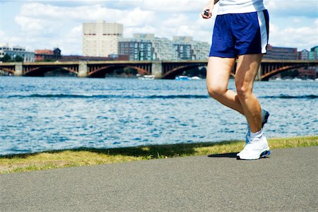 simsearch:625-00805928,k - Low section view of a person jogging Stock Photo - Premium Royalty-Free, Code: 625-00805976
