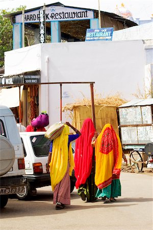 simsearch:625-00806447,k - Rear view of three women walking on the streets, Pushkar, Rajasthan, India Stock Photo - Premium Royalty-Free, Code: 625-00806023