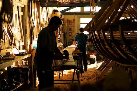Two carpenters working in a workshop, Spain Stock Photo - Premium Royalty-Free, Code: 625-00806133