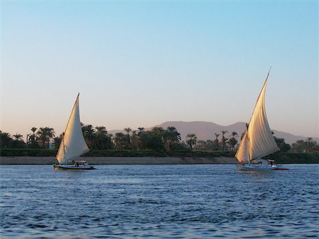 Two sailboats in a river, Nile River, Egypt Stock Photo - Premium Royalty-Free, Code: 625-00806510