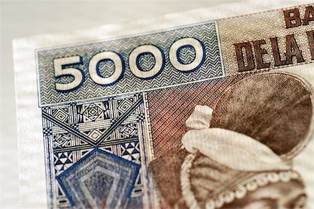 simsearch:625-00801281,k - Corner of one 5000 bank note, close-up Stock Photo - Premium Royalty-Free, Code: 625-00801222