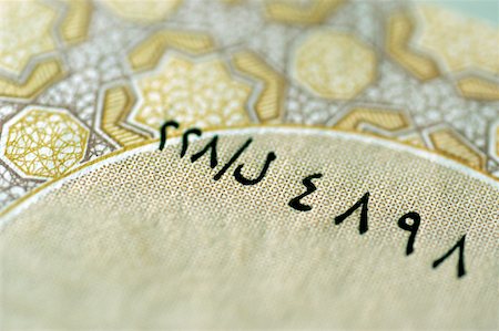 simsearch:625-00801281,k - Extreme close-up of bank note Stock Photo - Premium Royalty-Free, Code: 625-00801234