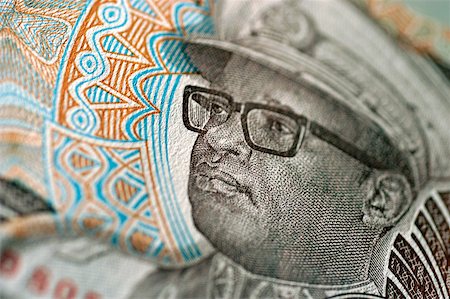 simsearch:625-00801281,k - Image of man wearing glasses on bank note, extreme close-up Stock Photo - Premium Royalty-Free, Code: 625-00801252