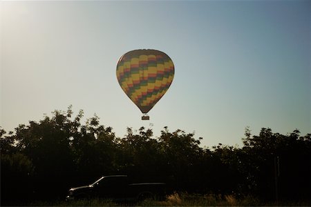 simsearch:625-00801301,k - Low angle view of a hot air balloon flying in the sky Stock Photo - Premium Royalty-Free, Code: 625-00801655