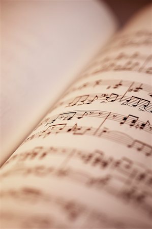pic music note symbol - Close-up of sheet music in book Stock Photo - Premium Royalty-Free, Code: 625-00801945