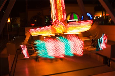 simsearch:625-00805928,k - Lights glowing on a carnival ride at night, California, USA Stock Photo - Premium Royalty-Free, Code: 625-00802035