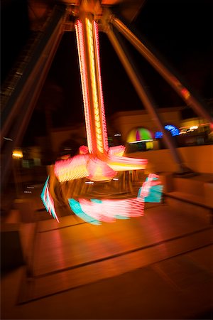 simsearch:625-00805928,k - Lights glowing on a carnival ride at night, California, USA Stock Photo - Premium Royalty-Free, Code: 625-00802036