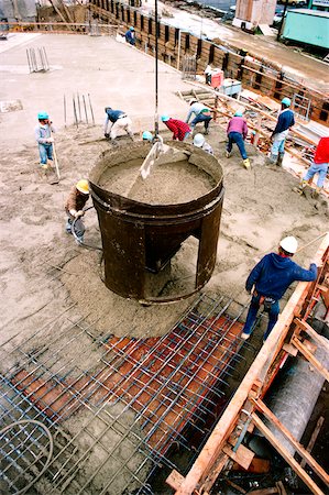 pourer - Workers on construction site pouring cement in new office building in Bethesda , Maryland Stock Photo - Premium Royalty-Free, Code: 625-00837539