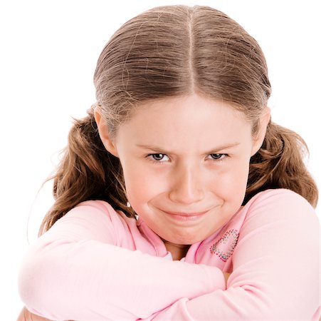 sad girls - Portrait of a girl with her arms folded Stock Photo - Premium Royalty-Free, Code: 625-00838568