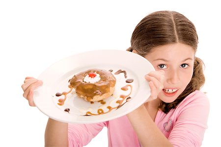 simsearch:625-01250196,k - High angle view of a girl holding a donut in a plate Stock Photo - Premium Royalty-Free, Code: 625-00838595