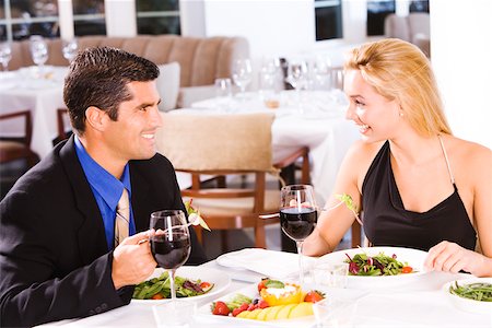 simsearch:625-00902698,k - Mid adult man and a young woman sitting in a restaurant Foto de stock - Sin royalties Premium, Código: 625-00838948