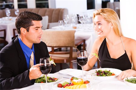 simsearch:625-00902698,k - Mid adult man and a young woman sitting in a restaurant Foto de stock - Sin royalties Premium, Código: 625-00838949